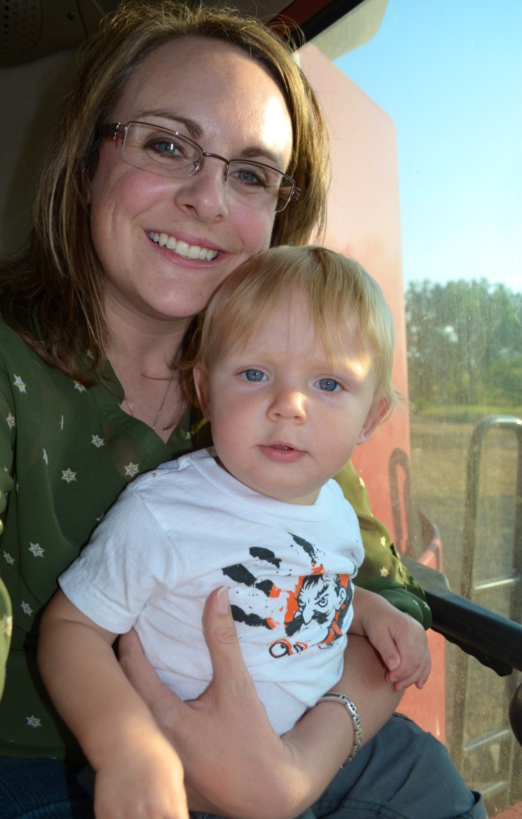 Riding in the combine.